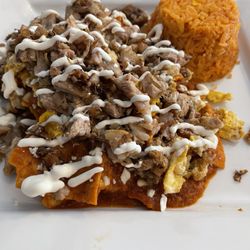 Chilaquiles with pork. So good. Best I've had in the North East.