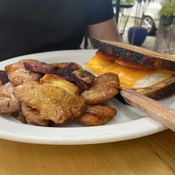 Over Easy - Breakfast sandwich with Portuguese sausage and crispy potatoes (the crispy sweet potatoes are my fav) - Breakfast & Brunch Near Me - Kailua, Hawaii Over Easy - Breakfast sandwich with Portuguese sausage and crispy potatoes (the crispy sweet potatoes are my fav) - Breakfast & Brunch Near Me - Kailua, Hawaii