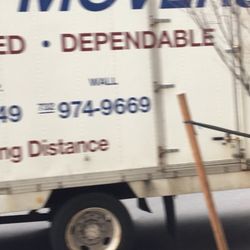 Econo-Line Movers Inc - Parking in NYC. Impressed they could parallel park this big truck.