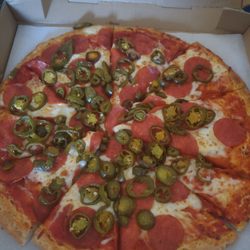 Super Pizza - Large jalapeño and pepperoni pizza.