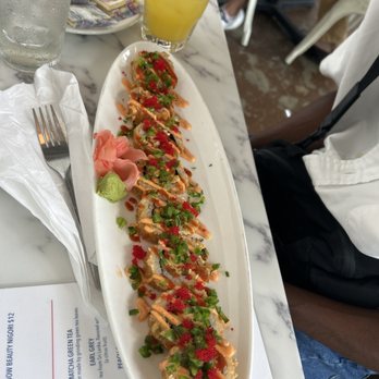 Saltwater Crab - Batman Roll with a Screwdriver cocktail - Seafood Near Me - Memphis, Tennessee Saltwater Crab - Batman Roll with a Screwdriver cocktail - Seafood Near Me - Memphis, Tennessee