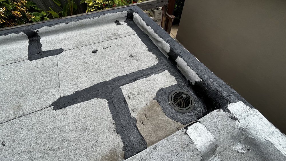 Slide of J&E Roofing Services