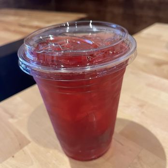 Quixotic Coffee - Tangerine ginger herbal tea over ice - Coffee & Tea Near Me - Saint Paul, Minnesota