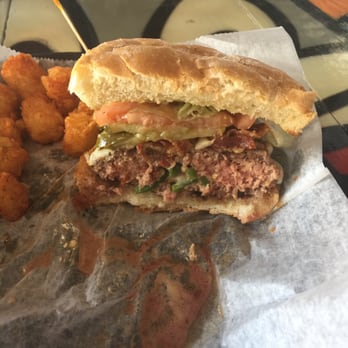 Graffiti Junktion - The inside of the sin burger. Stuffed burger with jalapeños and Brie cheese n bacon - American Near Me - Jacksonville Beach, Florida