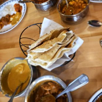 Seva Indian Cuisine - Garlic Naan. $4.954 A bit above the usual standard - Indian Near Me - Astoria, New York Seva Indian Cuisine - Garlic Naan. $4.954 A bit above the usual standard - Indian Near Me - Astoria, New York