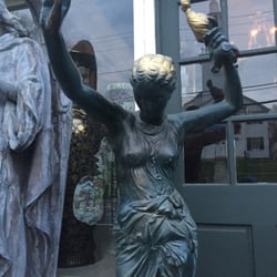 Martell & Suffin Antiques - She's got her hands in the air, and waves them like she just don't care