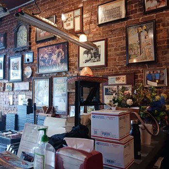 Nicahabana Cigars - a brick wall with a lot of pictures on it - Tobacco Shops Near Me - Tampa, Florida Nicahabana Cigars - a brick wall with a lot of pictures on it - Tobacco Shops Near Me - Tampa, Florida