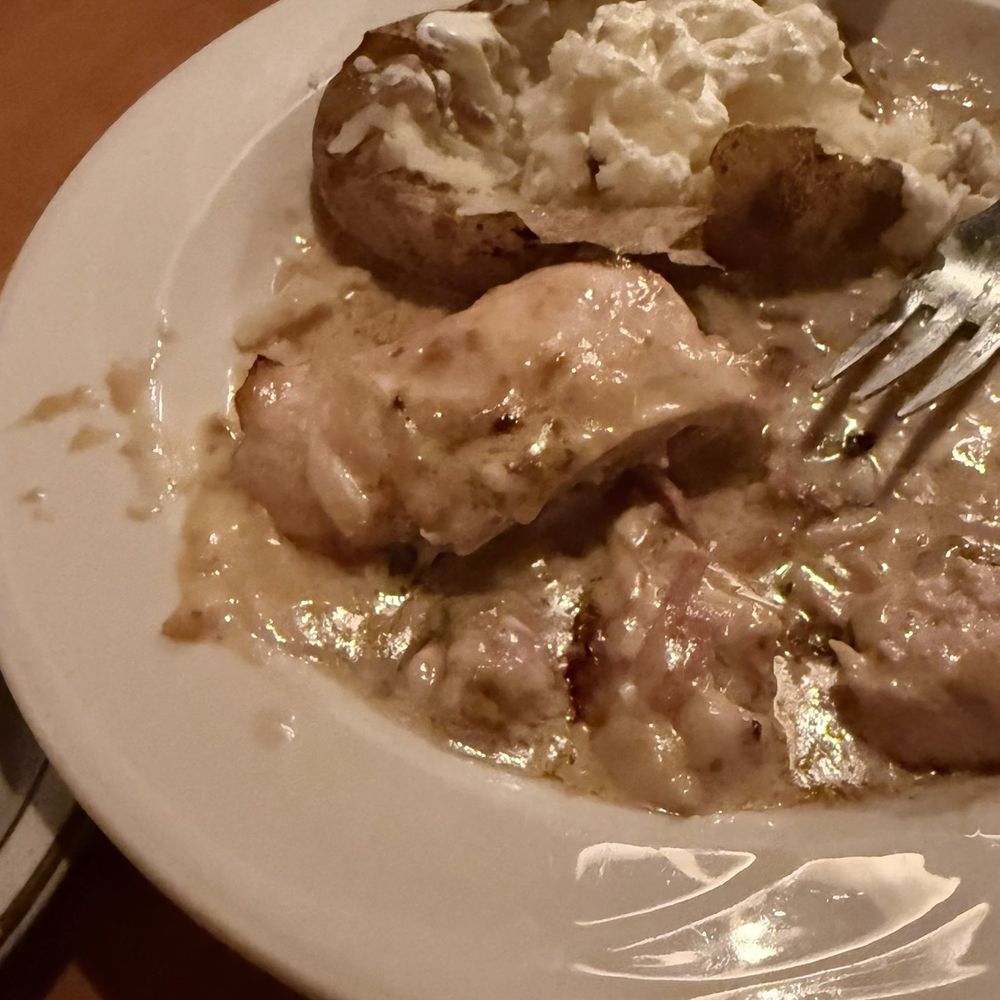 DJ'S Restaurant - Chicken Cordon Bleu loads of gravy with baked potato, salad and warm bread & eight dollar glass of Merlot - American Near Me - Ludlow, Vermont DJ'S Restaurant - Chicken Cordon Bleu loads of gravy with baked potato, salad and warm bread & eight dollar glass of Merlot - American Near Me - Ludlow, Vermont
