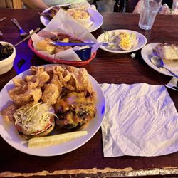 The Happy Hog - Smashburger, pork, rinds, collard greens, cornbread, coconut cream pie and deviled eggs, cheese grits.