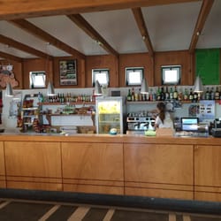 Queijo Vaquinha - Order counter and wine sampling area.