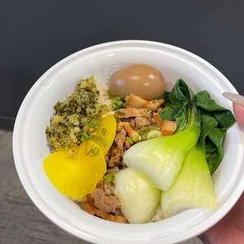 Typhoon BBT - a person holding a bowl of food - Taiwanese Near Me - Richmond, British Columbia Typhoon BBT - a person holding a bowl of food - Taiwanese Near Me - Richmond, British Columbia
