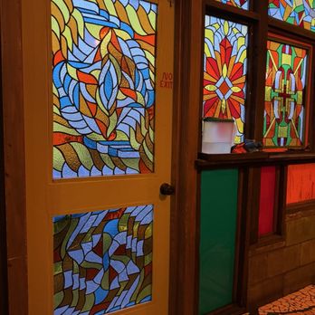 Satchel's Pizza - Stained glass in the patio. - Pizza Near Me - Gainesville, Florida