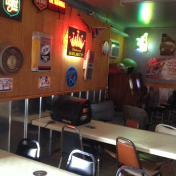 Kathy's Bar - tables, chairs, and neon signs - Bars Near Me - San Antonio, Texas