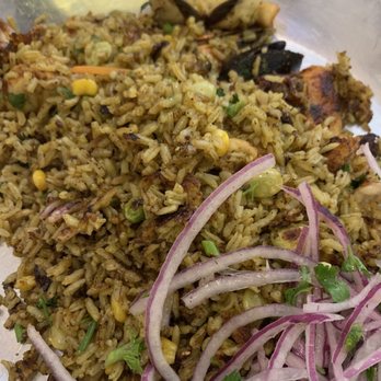 Inka Grill - The seafood was buried in the rice. I felt like a giant eating the tiny octopuses. - Peruvian Near Me - Lake Forest, California Inka Grill - The seafood was buried in the rice. I felt like a giant eating the tiny octopuses. - Peruvian Near Me - Lake Forest, California