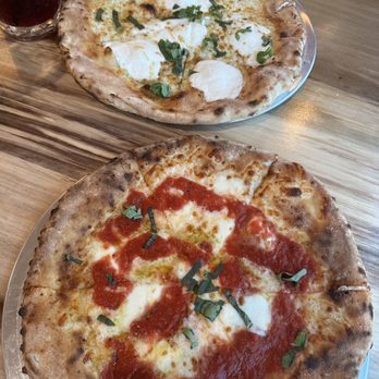 Margherita Pizza - Margarita pizza and a white pizza. Too thin. Not enough flavor. - Italian Near Me - Surf City, North Carolina Margherita Pizza - Margarita pizza and a white pizza. Too thin. Not enough flavor. - Italian Near Me - Surf City, North Carolina