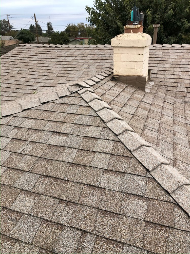 Slide of Lopez Roofing Services