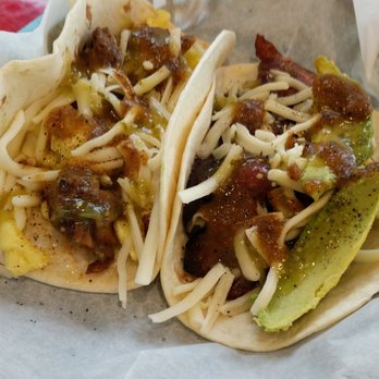 Tacodeli - (Left) Sirloin, Egg & Cheese. (Right) The Otto. (Both with delicious Salas on them! - Breakfast & Brunch Near Me - Austin, Texas Tacodeli - (Left) Sirloin, Egg & Cheese. (Right) The Otto. (Both with delicious Salas on them! - Breakfast & Brunch Near Me - Austin, Texas