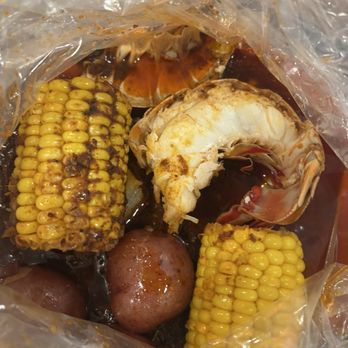 Bag O' Crab - Build your own bags with lobster tail. There was more potatoes and another half of the tail. - Seafood Near Me - Tucson, Arizona Bag O' Crab - Build your own bags with lobster tail. There was more potatoes and another half of the tail. - Seafood Near Me - Tucson, Arizona