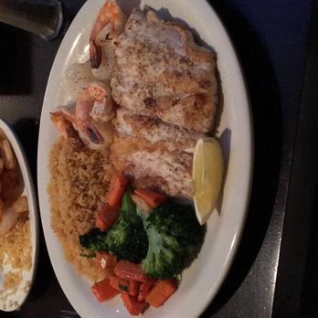 Spanish Pavillion Restaurant - Seasoned Sea bass, shrimp,  veggies and yellow rice - Seafood Near Me - Harrison, New Jersey