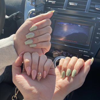 NK Nail Lounge - Green gel on coffin shape and pink gel with butterflies on almond shape - Nail Salons Near Me - Monroe, Washington