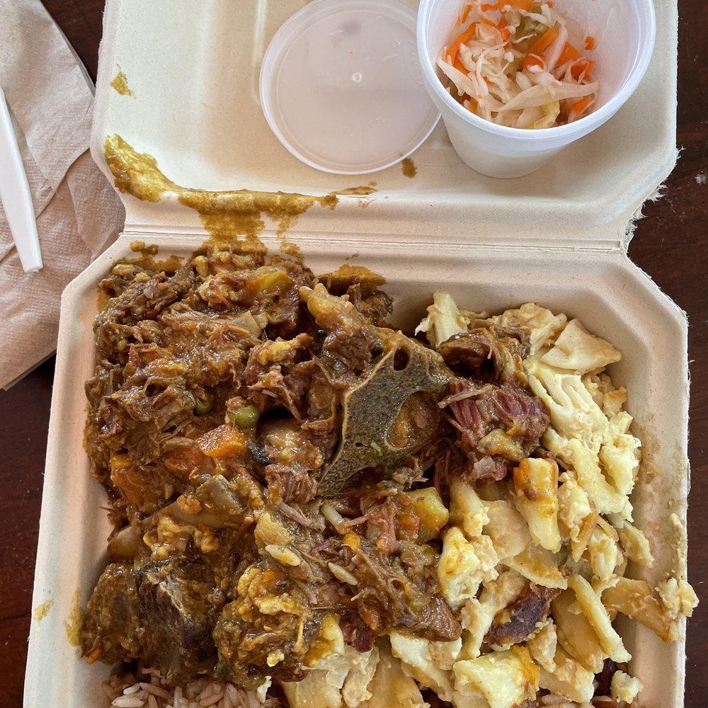 Naomi's Garden - Goat Curry Goat with rice & beans and Mac and Cheese - Haitian Near Me - Miami, Florida Naomi's Garden - Goat Curry Goat with rice & beans and Mac and Cheese - Haitian Near Me - Miami, Florida