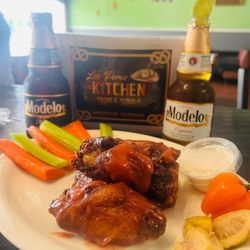 Los Perez Kitchen - Mango habanero chicken wings, fresh never frozen. Sauce made in house