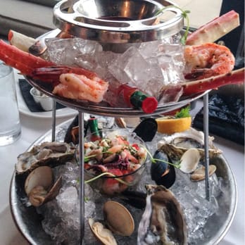333 Pacific - Seafood tower for 2! 4 of each: crab legs, cocktail shrimp, mussels, oysters, & clams. Huge glass of cerviche in the middle~ - Steakhouses Near Me - Oceanside, California 333 Pacific - Seafood tower for 2! 4 of each: crab legs, cocktail shrimp, mussels, oysters, & clams. Huge glass of cerviche in the middle~ - Steakhouses Near Me - Oceanside, California