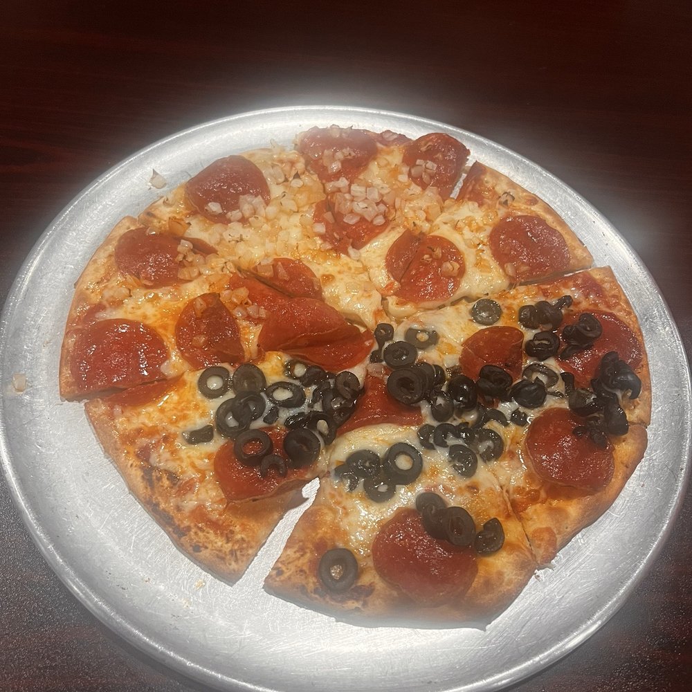 The Depot Pizzeria - Customized pepperoni with half black olive and other half onion. - Pizza Near Me - Marion, Arkansas The Depot Pizzeria - Customized pepperoni with half black olive and other half onion. - Pizza Near Me - Marion, Arkansas