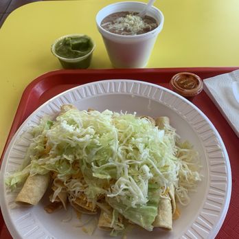 Nico's Mexican Food - Rolled tacos, no pico, guacamole on the side. Plus and a side order of refried beans.  Yummy! - Mexican Near Me - Tucson, Arizona