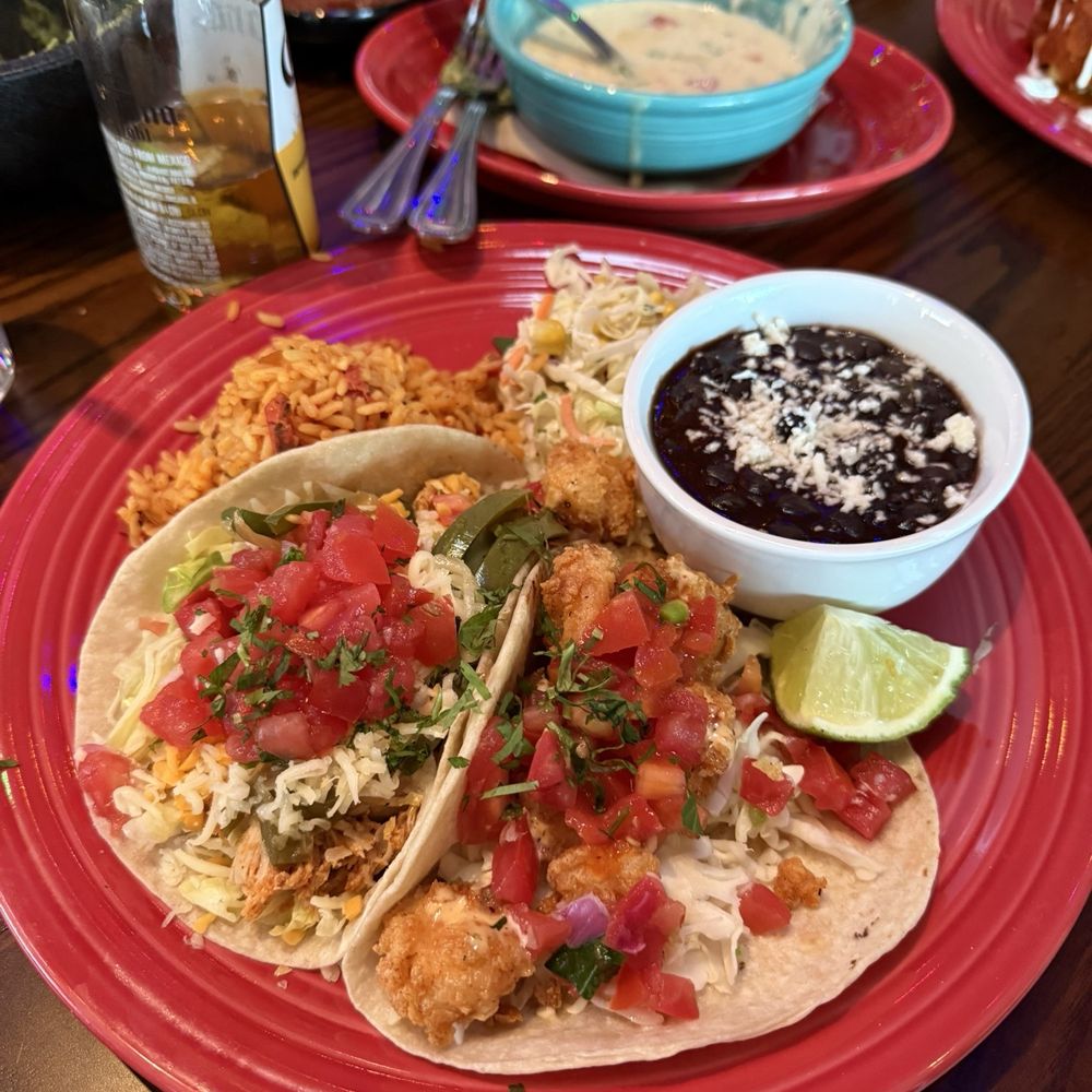 Tacos, queso, and Coronas! No complaints here. Tacos, queso, and Coronas! No complaints here.