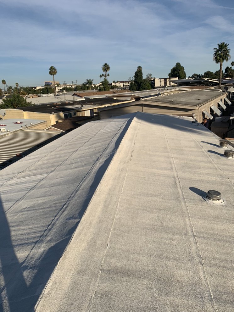 Slide of Adams Roofing