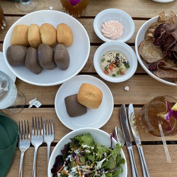 Old Lahaina Luau - Kalo & Sweet Potato Chips, fresh Maui pineapple. Maui farmed green salad with bread basket and Maui honey-guava butter spread. - Performing Arts Near Me - Lahaina, Hawaii