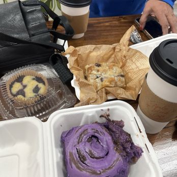 Apelu Island Cafe - Taro Cinnamon bun, Bread pudding with raisins, Caramel Apple Butter Macchiato, and the Island Time Latte - Bagels Near Me - Norfolk, Virginia