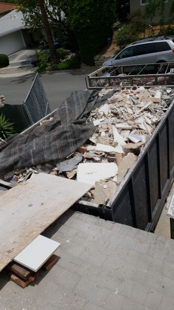 Slide of Alex's Hauling & Demo