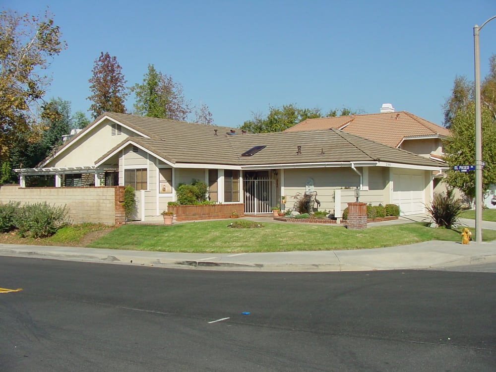 Slide of Valencia Roofing Company