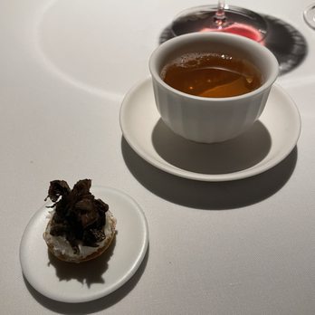 Kiln - Broth of smoked pork trotters, koji oil; andante 'tomme dolce' perigold truffle, iberico - New American Near Me - San Francisco, California Kiln - Broth of smoked pork trotters, koji oil; andante 'tomme dolce' perigold truffle, iberico - New American Near Me - San Francisco, California