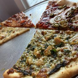 Quattro Staggioni Pizza. It is 2 slices Caruso Pizza, Bianco Pizza, Vesuvio Pizza and Genovese Pizza. Soooooo goood! Quattro Staggioni Pizza. It is 2 slices Caruso Pizza, Bianco Pizza, Vesuvio Pizza and Genovese Pizza. Soooooo goood!
