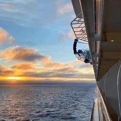 Roselle Travel - Sunset on the NCL Bliss
