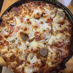 Anchorage Inn - German pizza ( sauerkraut, pickles, bratwurst, cheese)
