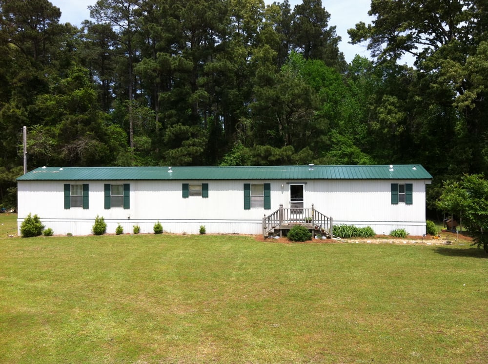 Slide of Shields Metal Roofing