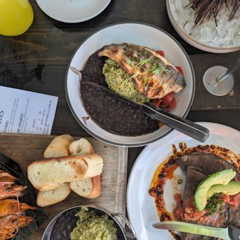 Holbox - Filete al Carbon Mesquite grilled filet of branzino, cilantro rice, black beans, x'catic sauce, avocado, pico de gallo  - $18 - Latin American Near Me - Los Angeles, California