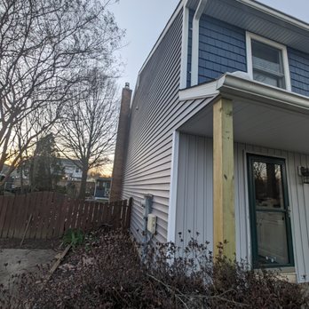 Chesapeake Roofing, Windows & Siding - Vertical sterling grey in front granite grey clapboard on side and back. - Roofing Near Me - Davidsonville, Maryland