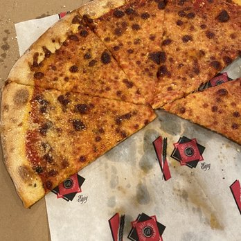 Mickeys NY Pizza - a half eaten pizza - Pizza Near Me - Hudson, New Hampshire