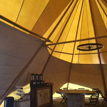 Under Canvas Moab - Lobby with coffee, tea, water, and board games/ chess. - Campgrounds Near Me - Moab, Utah Under Canvas Moab - Lobby with coffee, tea, water, and board games/ chess. - Campgrounds Near Me - Moab, Utah