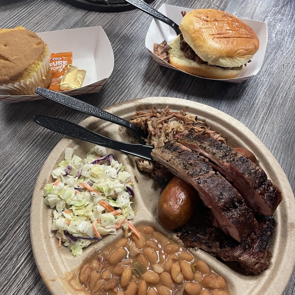Big John's Texas BBQ - Sampler with cornbread (a must!) and brisket sandwich - Barbeque Near Me - Page, Arizona Big John's Texas BBQ - Sampler with cornbread (a must!) and brisket sandwich - Barbeque Near Me - Page, Arizona