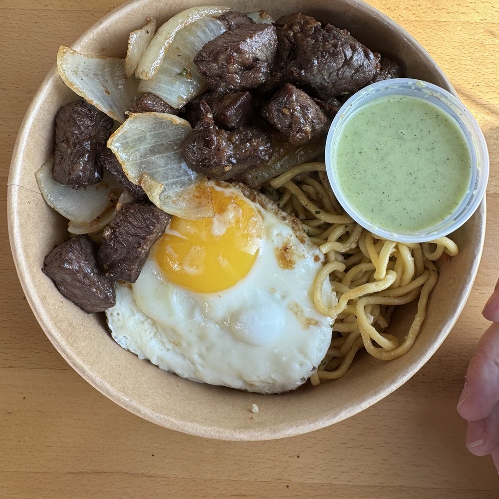 Saiga Vietnamese Eatery - Garlic Noodles with steak bites and fried egg - Vietnamese Near Me - Orange, California Saiga Vietnamese Eatery - Garlic Noodles with steak bites and fried egg - Vietnamese Near Me - Orange, California