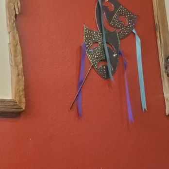 Baby Kay's Cajun Kitchen - Masks on wall - Cajun/Creole Near Me - Mesa, Arizona