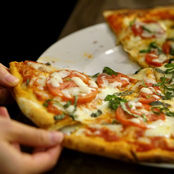 Connect Lounge - two slices of pizza on a plate - Cafes Near Me - AL, Alabama Connect Lounge - two slices of pizza on a plate - Cafes Near Me - AL, Alabama