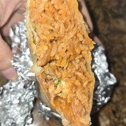 Mariella's Tacos - Look at how thin this burrito is. Where is the meat?! Absolutely a waste of money
