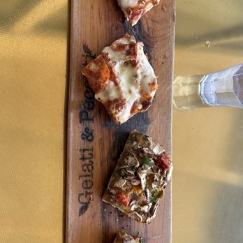 Gelati & Peccati - three slices of pizza on a cutting board - Pizza Near Me - Encinitas, California